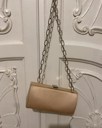 Pochette vintage versus versace