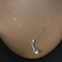 collana in oro 18k con perla e diamanti 