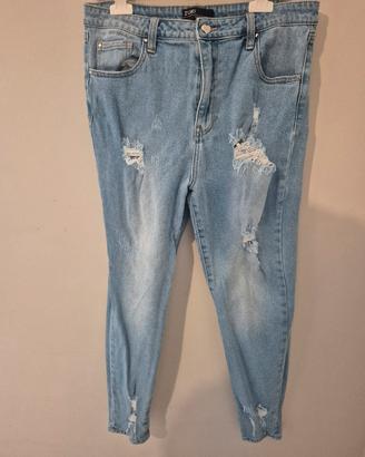jeans chiari effetto strappato