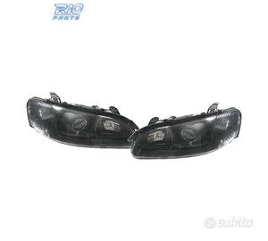 FARI PER OPEL OMEGA 94-99 LENTE A LENTE NERA