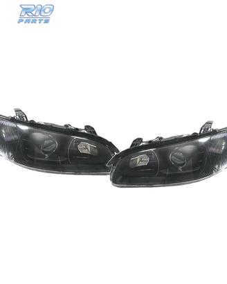 FARI PER OPEL OMEGA 94-99 LENTE A LENTE NERA