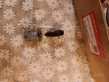 Tappo benzina e blocchetto Transalp750 2024
