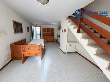 Casa a schiera con giardino