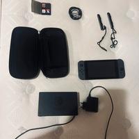 Nintendo Switch + Cover, Station, Pad e giochi.