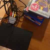 play station 2 con cavi + 8 giochi 