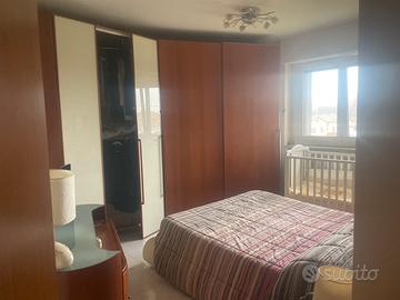 Armadio con ante scorrevoli e con cabina