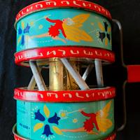 Gioco a traino spingere di latta vintage