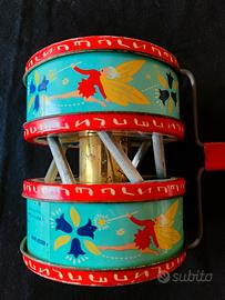 Gioco a traino spingere di latta vintage