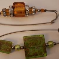 2 spille con perle in vetro di Murano