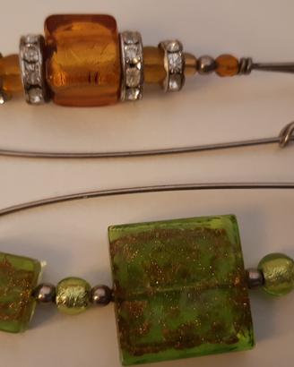 2 spille con perle in vetro di Murano