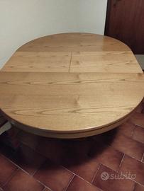 tavola rotonda allungabile con sedie 