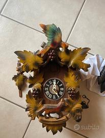 Orologio a cucù uva e la volpe