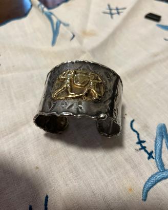 Accessori , bracciale rigido a polsino