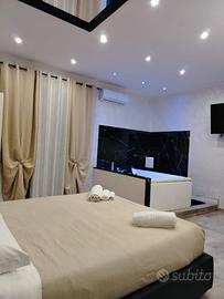 Elegante bivani arredato