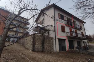 Trilocale con giardino, garage e mansarda