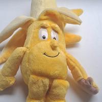 Peluche banana con faccino sorridente 🍌 