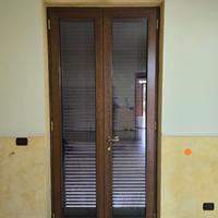 Infissi in pvc R 40 color noce  vetro camera