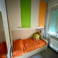 Armadio a ponte con lettino