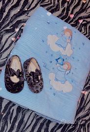 Scarpe e copertina
