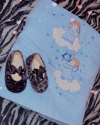 Scarpe e copertina