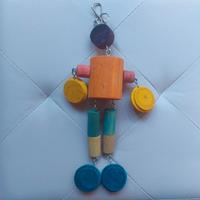 Gioco in legno per pappagalli