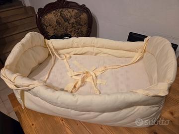Riduttore per letto per neonato