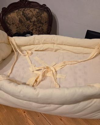 Riduttore per letto per neonato