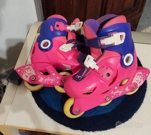 Pattini bambina regolabili 26/28 + kit protezioni