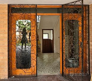 Portone ingresso in ferro battuto