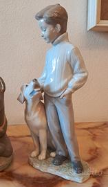 statua bambino con cane Lladrò 
