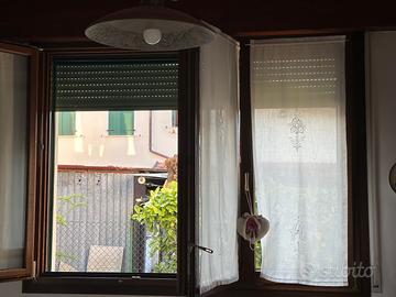 Finestra con zanzariera