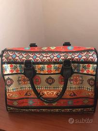 BORSA DESIGUAL
