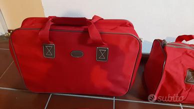 Set viaggio: valigia, borsone, trousse