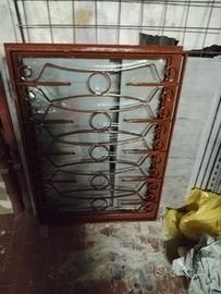 serramento doppio vetro con inferriata in ferro 