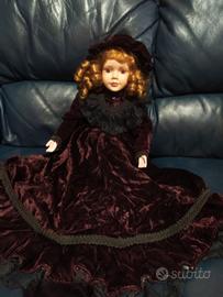 bambola in porcellana in velluto 