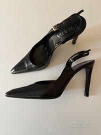 Scarpe Prada “capretto Cruel” in pelle nera.