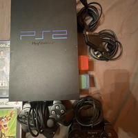 Ps2 fat con 2 controller,2 memory card e 4 giochi