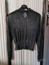 Top nero con pailettes