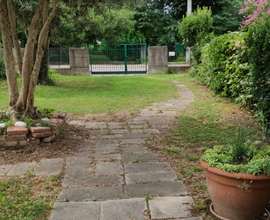 Casa a schiera con ampio giardino