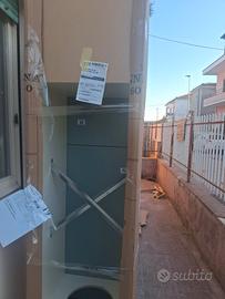 Mobile colonna Mondo Convenienza e frigo Candy da 