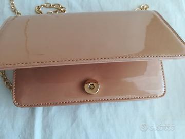 POSCHETTE marca PRIMA DONNA con catenella dorata