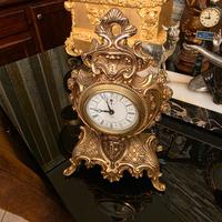 Antico orologio meccanico in antominio