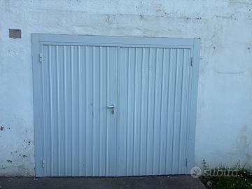 Porta da garagge o capanno