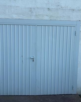 Porta da garagge o capanno