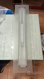 Lampadario in vetro con tubi a neon x cucina