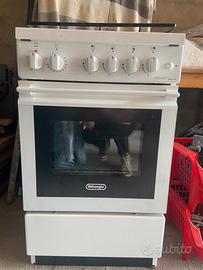 Piano cottura con forno a gas delonghi
