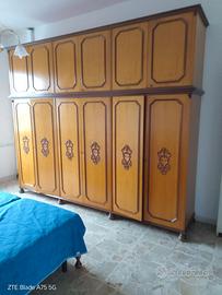 divano, letto e armadio