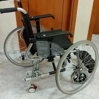 sedia per disabile piu' girello