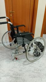 sedia per disabile piu' girello