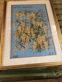 Quadro con ricamo puntocroce fiorito